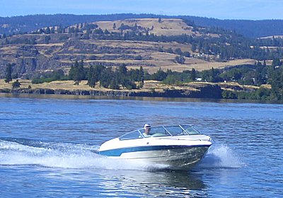 A glassy day for our 20 foot Reinell I/O ski boat with 302 Ford Cobra V-8